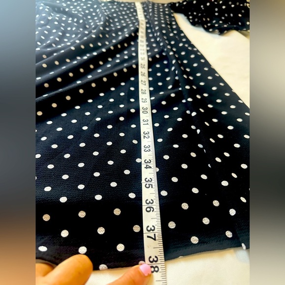 Brand: NAIF, black dress, with white dots, and flared sleeves - Picture 5 of 12